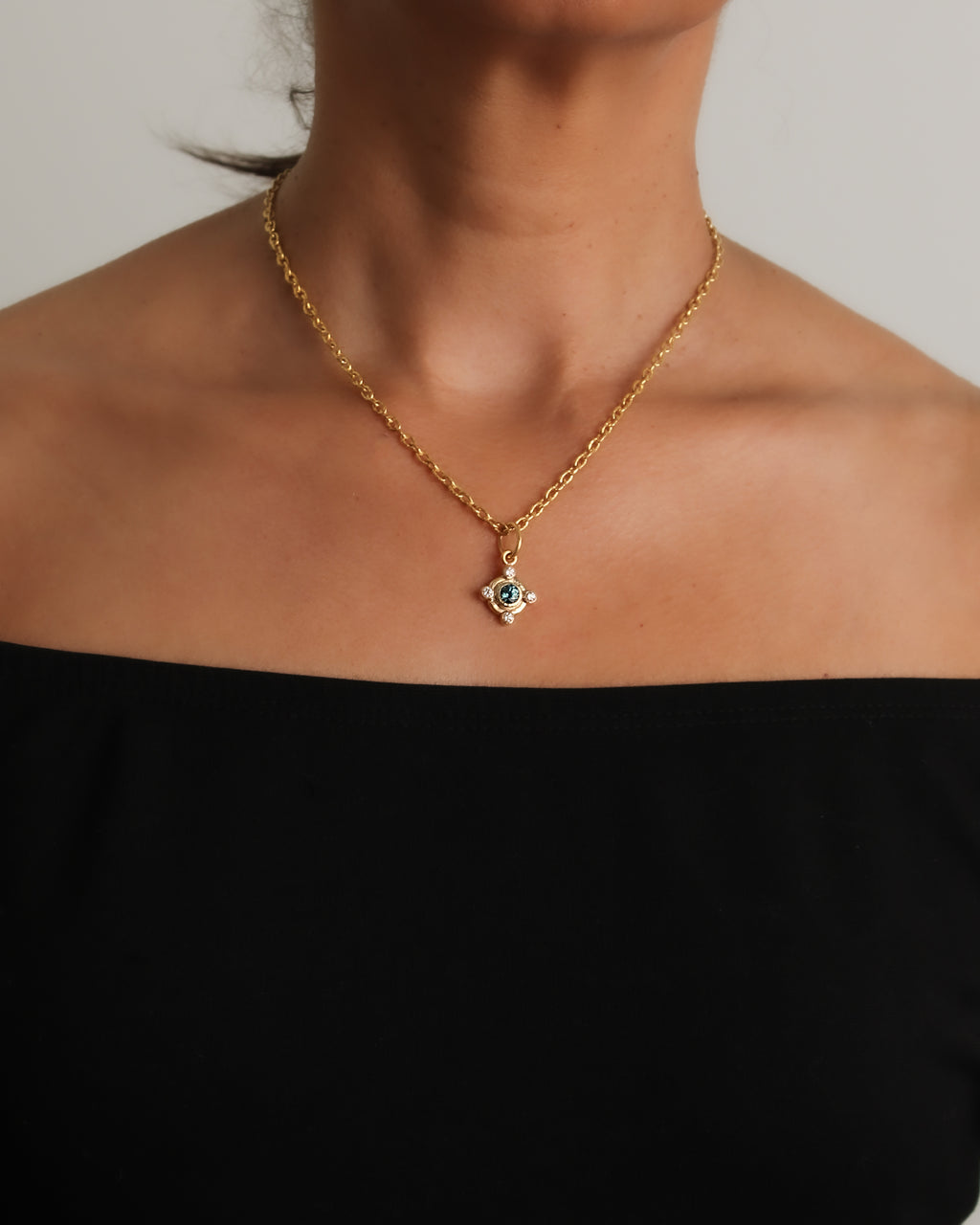 Blue Zircon and Diamond Pendant