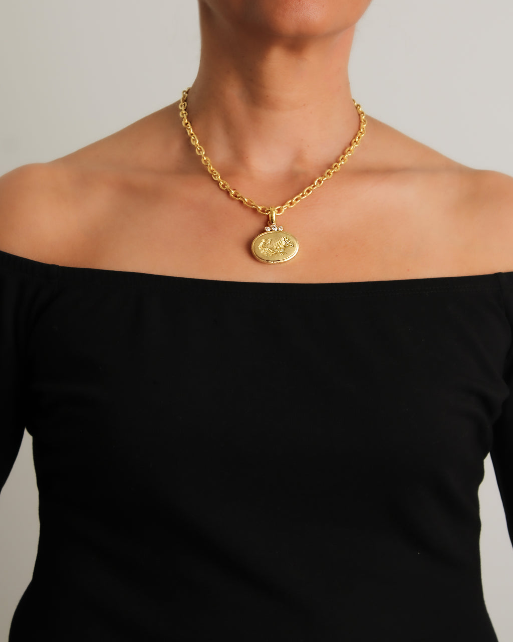 Gold 'Goddess with Chariot' and Diamond Pendant