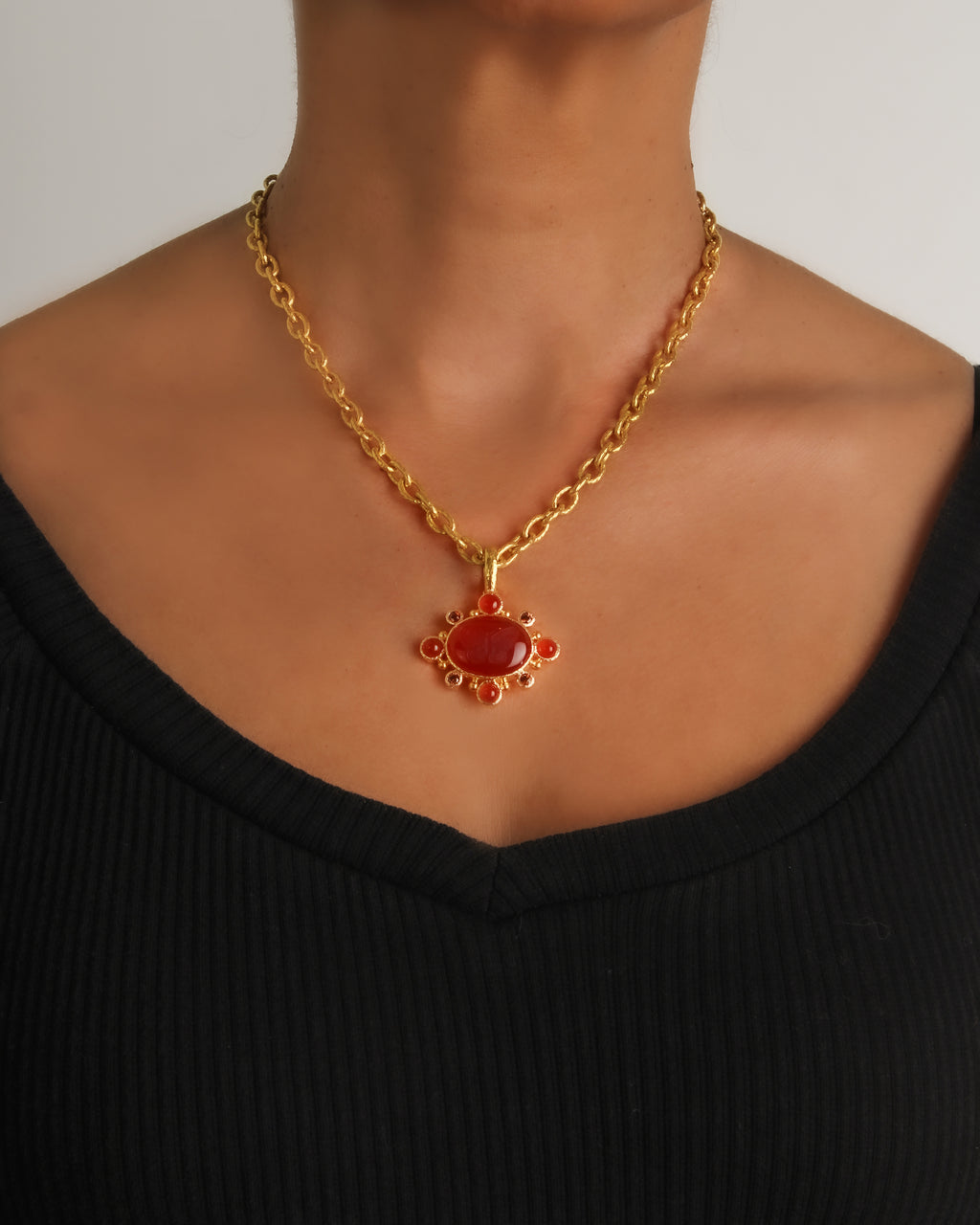 Carnelian 'Moth' with Brown Zircon Pendant